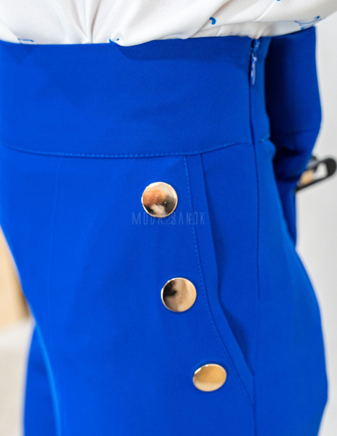 Chabrowe eleganckie spodnie damskie z szeroką nogawką i rzędowymi guzikami CORALLINE- MODA SANOK Chabrowe eleganckie spodnie damskie z szeroką nogawką i rzędowymi guzikami CORALLINE- MODA SANOK