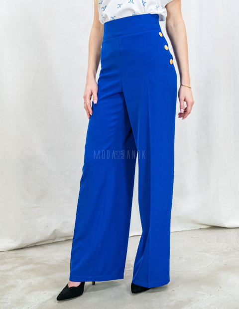 Chabrowe eleganckie spodnie damskie z szeroką nogawką i rzędowymi guzikami CORALLINE- MODA SANOK Chabrowe eleganckie spodnie damskie z szeroką nogawką i rzędowymi guzikami CORALLINE- MODA SANOK