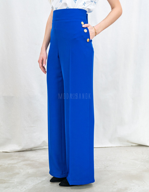 Chabrowe eleganckie spodnie damskie z szeroką nogawką i rzędowymi guzikami CORALLINE- MODA SANOK Chabrowe eleganckie spodnie damskie z szeroką nogawką i rzędowymi guzikami CORALLINE- MODA SANOK