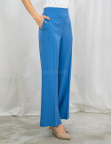 Jasnoniebieskie eleganckie spodnie damskie z szeroką nogawką i rzędowymi guzikami CORALLINE- MODA SANOK Jasnoniebieskie eleganckie spodnie damskie z szeroką nogawką i rzędowymi guzikami CORALLINE- MODA SANOK