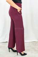Bordowe eleganckie spodnie damskie z szeroką nogawką i rzędowymi guzikami CORALLINE- MODA SANOK Bordowe eleganckie spodnie damskie z szeroką nogawką i rzędowymi guzikami CORALLINE- MODA SANOK