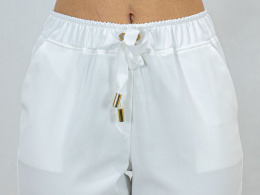 Eleganckie spodnie na szerokiej gumie w kolorze białym LAVNIA - MODA SANOK