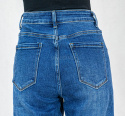 Spodnie jeansowe damskie slim ze średnim stanem i zwężaną nogawką - MODA SANOK