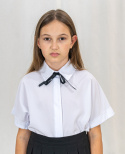 Elegancka biała dziewczęca bluzka z krótkim rękawem i kokardką przy kołnierzu - MODA SANOK Elegancka biała dziewczęca bluzka z krótkim rękawem i kokardką przy kołnierzu - MODA SANOK