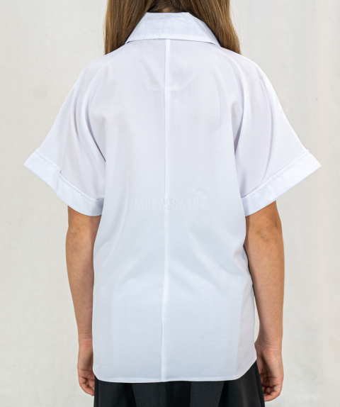 Elegancka biała dziewczęca bluzka z krótkim rękawem i kokardką przy kołnierzu - MODA SANOK Elegancka biała dziewczęca bluzka z krótkim rękawem i kokardką przy kołnierzu - MODA SANOK