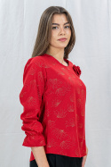 Elegancka czerwona bluzka w złote wzory z długim rękawem i różą przy dekolcie - MODA SANOK Elegancka czerwona bluzka w złote wzory z długim rękawem i różą przy dekolcie - MODA SANOK